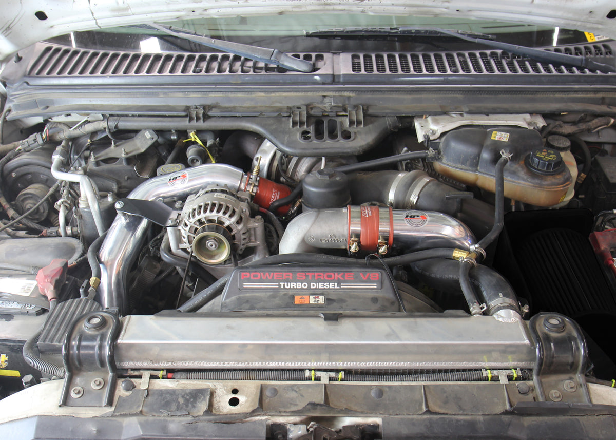 HPS Performance Hot & Cold Side Charge Pipe with Orange CAC Hose Intercooler Boots (Black) - Ford F-250 Superduty / Ford F-350 Superduty / Ford F-450 Superduty / Ford F-550 Superduty - (2003-2007)
