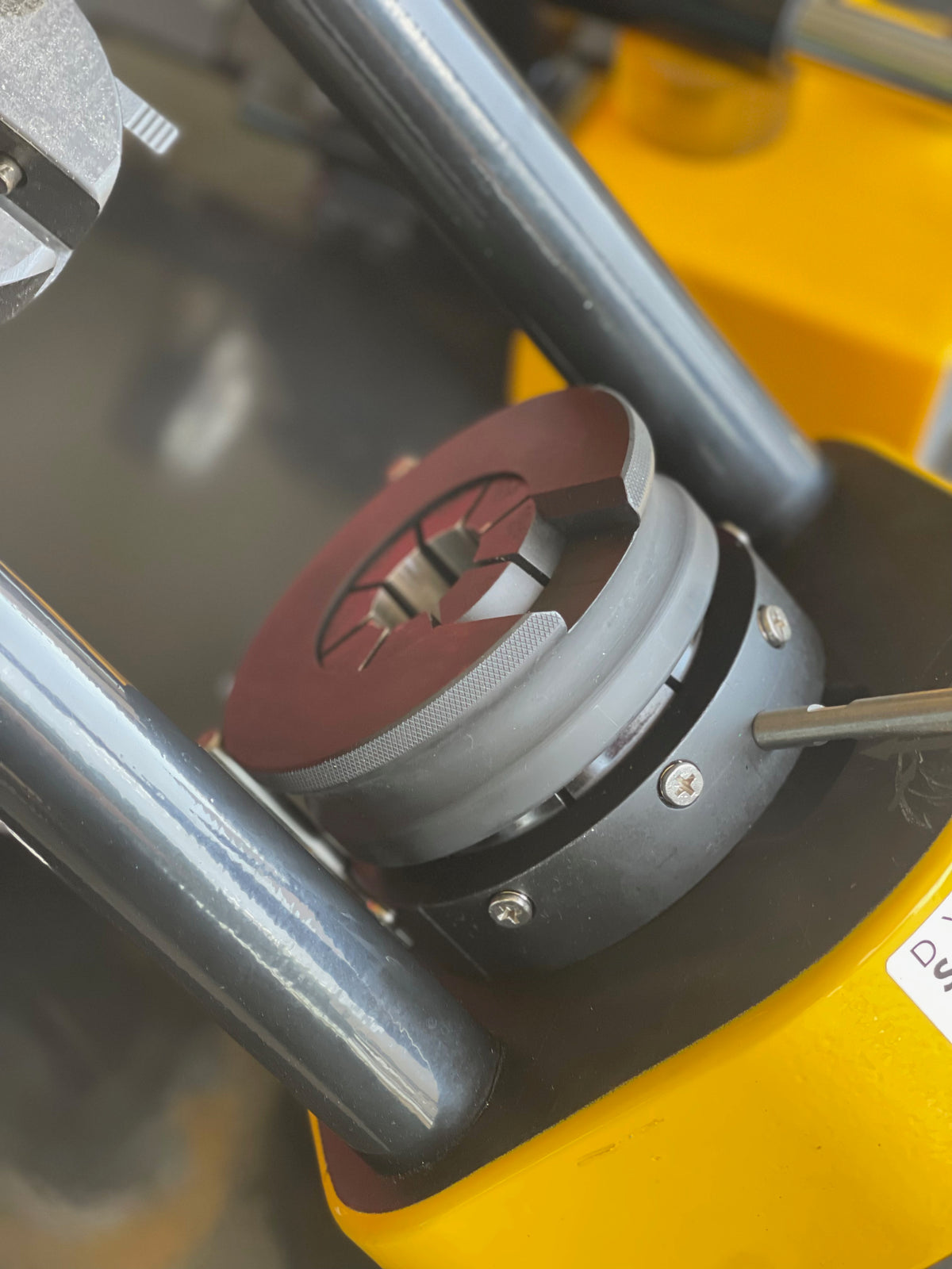 Dyme PRO AN adapter being fitted in a crimping tool