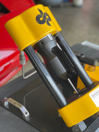Dyme PRO/SPEC AN Adapters being crimped by a yellow machine
