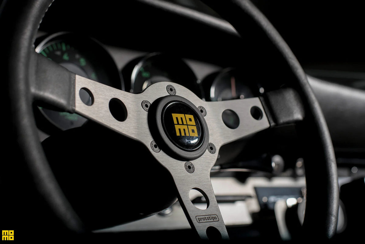 MOMO Prototipo Heritage 350mm Steering Wheel - Black Distressed Leather, Black Anodized Spokes - MOMO model installation example