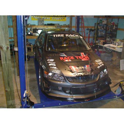 APR Performance Carbon Fiber Front Wind Splitter w/ Support Rods - Mitsubishi Lancer Evolution 9 (2006-2007)